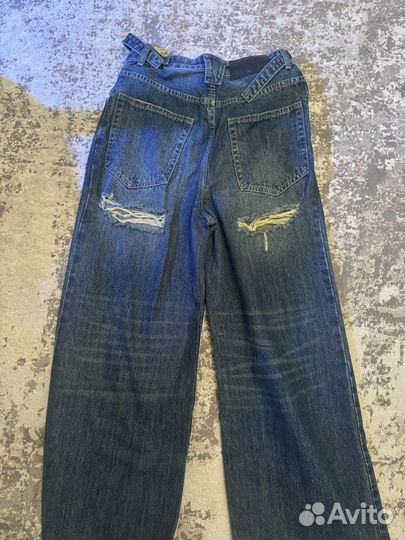 Джинсы широкиес разрезом