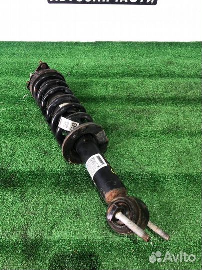Стойка амортизатора передняя левая Ford Ranger