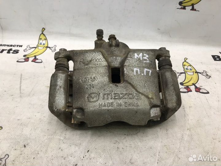 Суппорт тормозной передний правый Mazda 3 BM