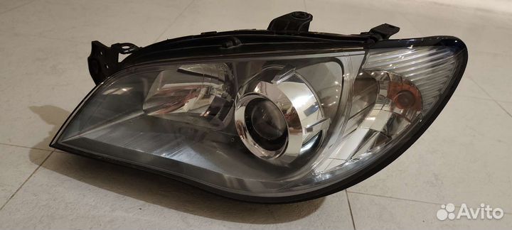 Фара левая Subaru Impreza лиса