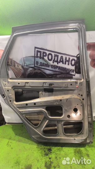 Дверь задняя левая калина