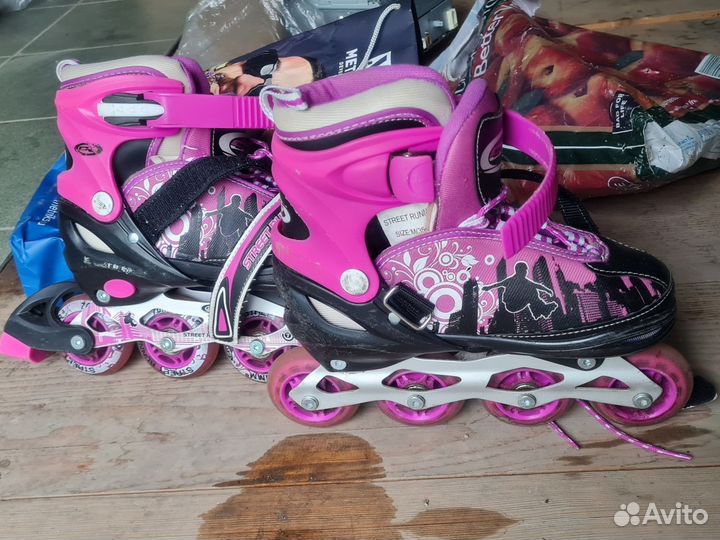 Роликовые коньки