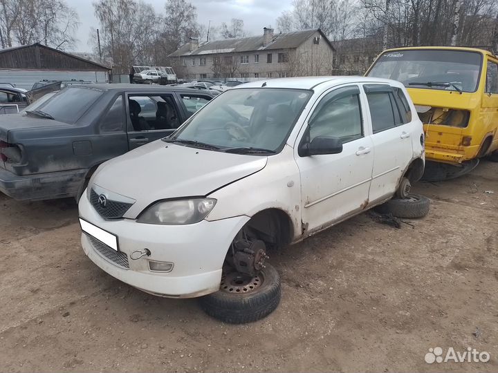 Суппорт правый левый Mazda Demio DY3W