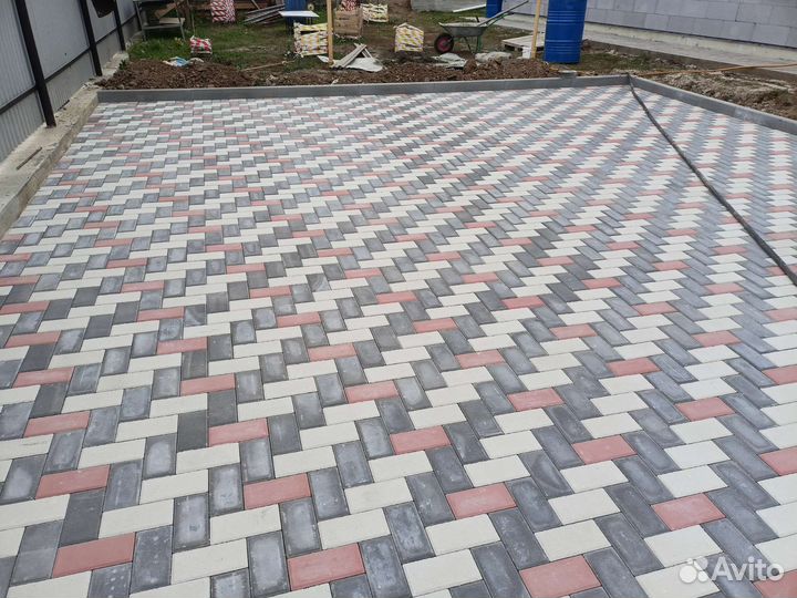 Укладка тротуарной плитки брусчатки