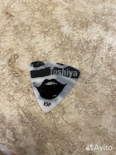 Медиатор для игры на гитаре