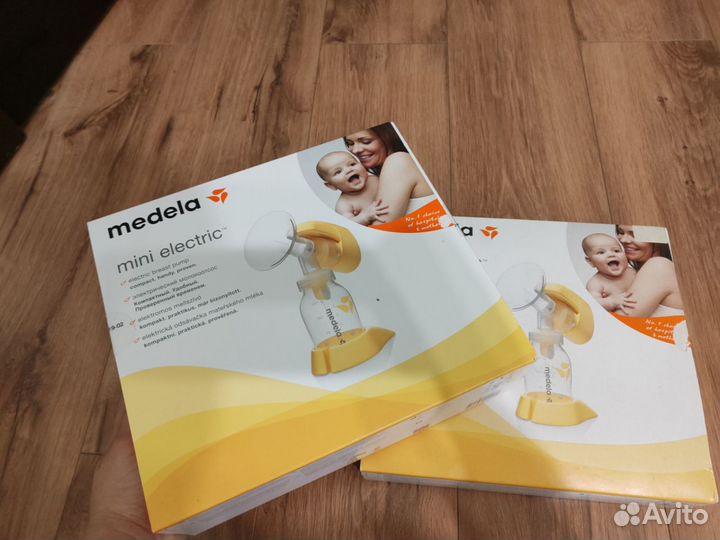 Молокоотсос medela электрический