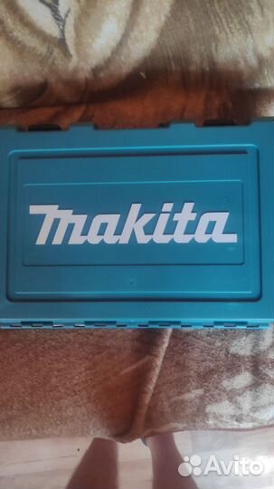 Перфоратор Makita HR2475