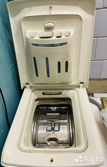 Стиральная машинка с вертикальной загрузкой