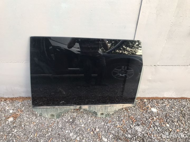 Стекло двери заднее левое туарег 1