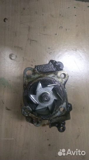 Водяная помпа насос Mitsubishi Carisma 1.6 4G92