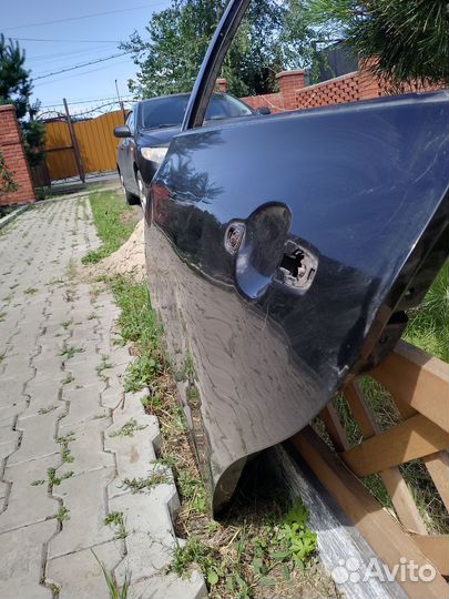 Дверь задняя левая тойота королла 150