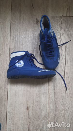 Футбольные бутсы, борцовки, и борцовское трико