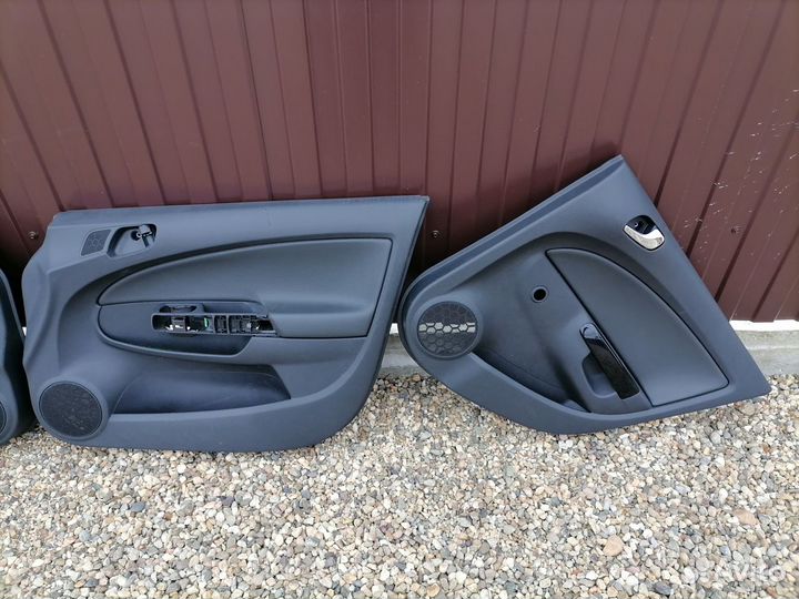Opel Corsa D обшивки дверей