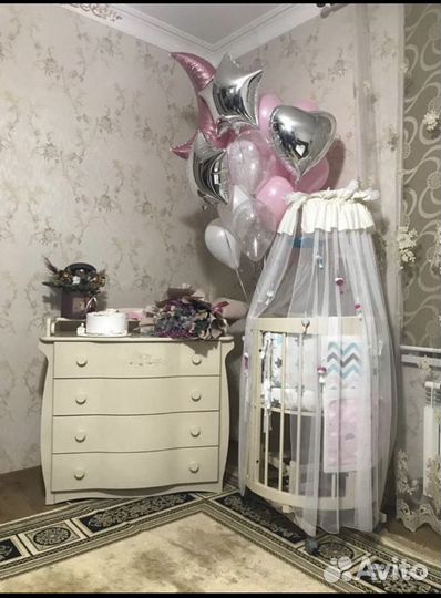 Детская кроватка с маятником