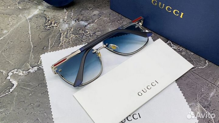 Солнцезащитные очки Gucci