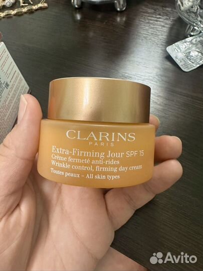 Пустые баночки от крема Clarins