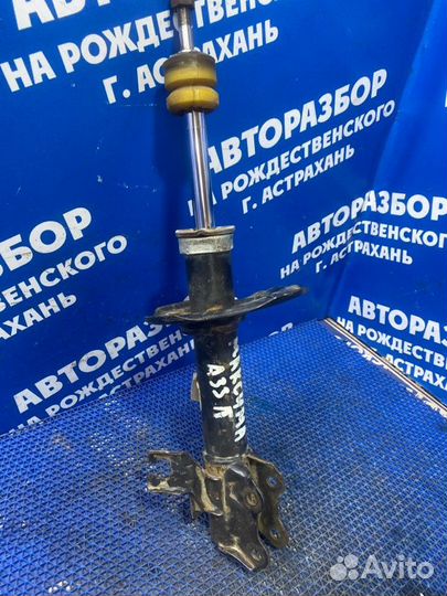 Передняя левая стойка амортизатора Nissan Maxima