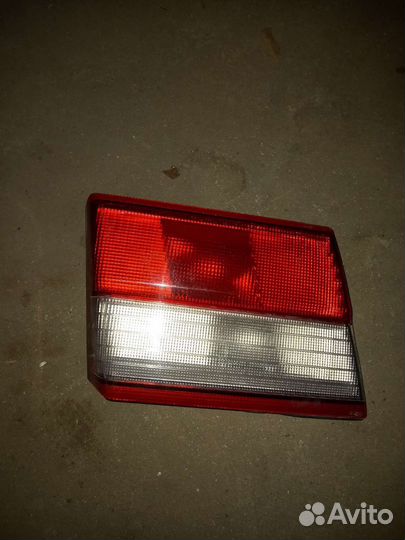 Фонарь багажника тойота карина е