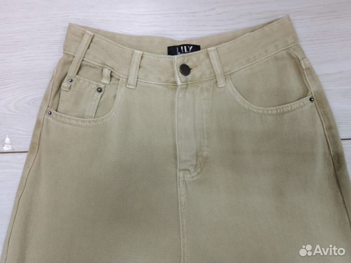 Бежевые джинсы женские