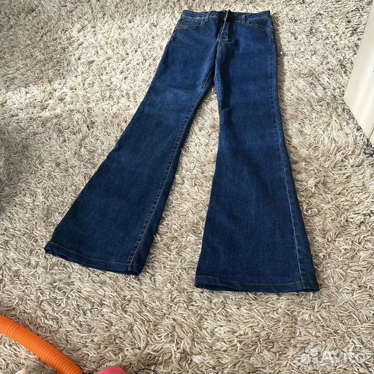 Джинсы клеш