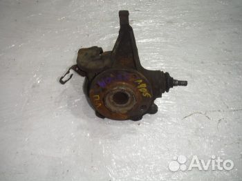 Кулак передний левый Пежо