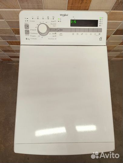 Стиральная машина с вертикальной загрузкой