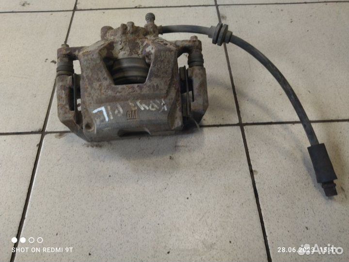 Суппорт тормозной передний левый Chevrolet Cruze