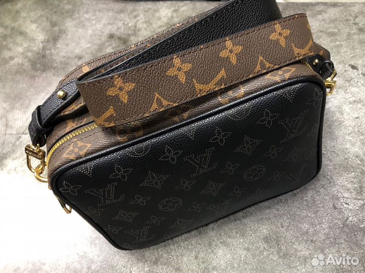 Сумка Louis Vuitton из кожи канва