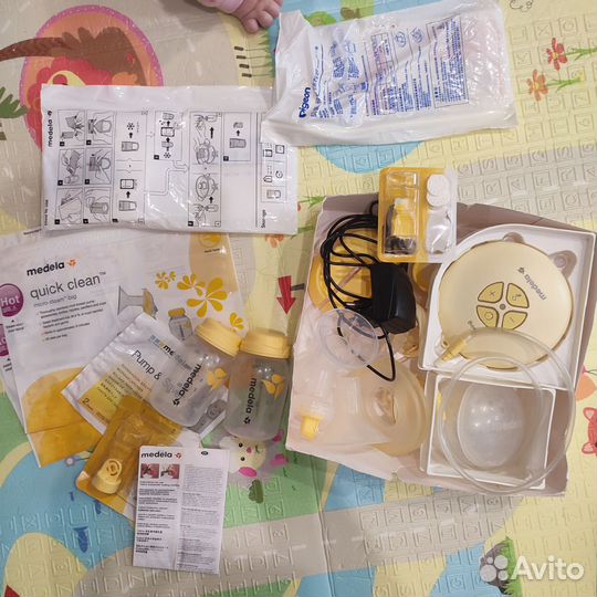 Молокоотсос medela электрический