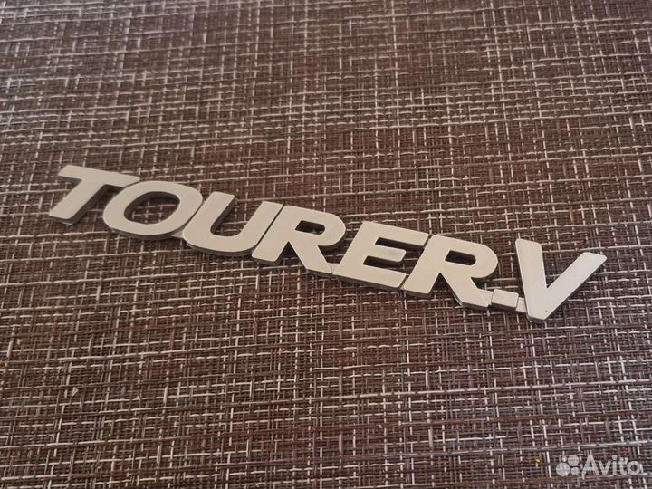 Шильдик Tourer V