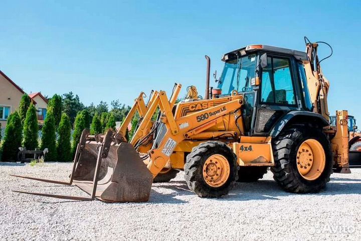 Экскаватор погрузчик Гидромолот