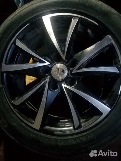 Литой диск с резиной