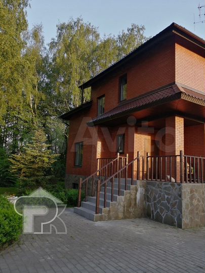 Коттедж 257 м² на участке 12 сот.