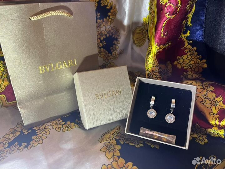 Серьги в стиле bvlgari с меняющимися фианитами