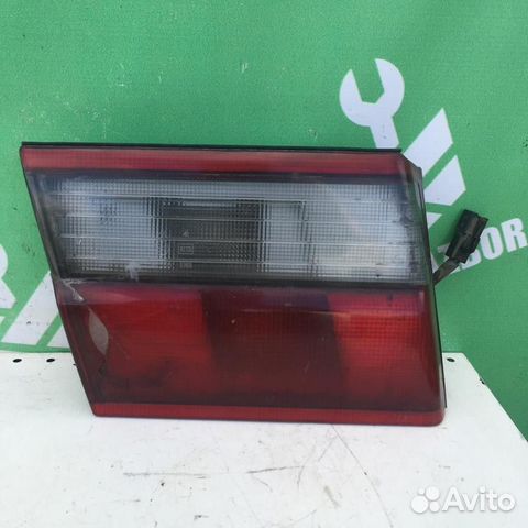 Фонарь задний внутренний левый Тойота Карина Е