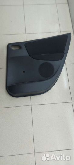 Обивка задней правой двери peugeot 207
