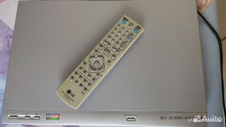 DVD/VCD/CD плеер с караоке LG