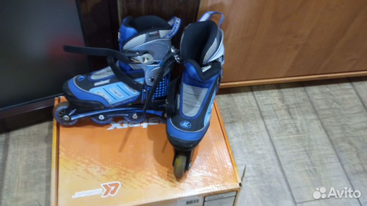 Роликовые коньки