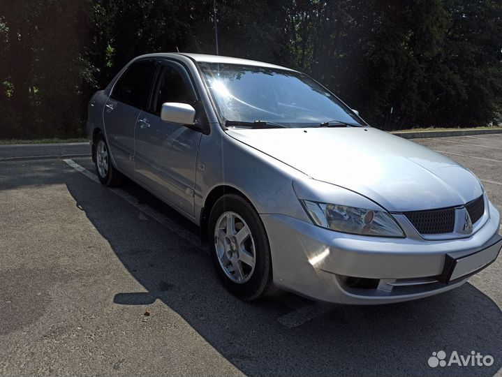 Mitsubishi Lancer 1.6 МТ, 2006, 413 523 км