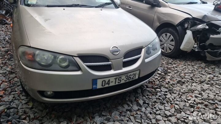 Фонарь задний левый nissan almera N16 2004