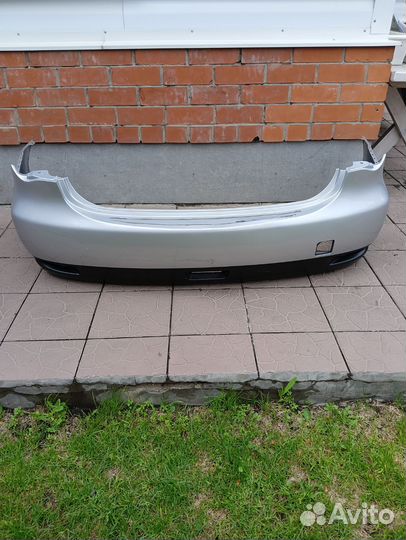 Бампер Nissan almera g15