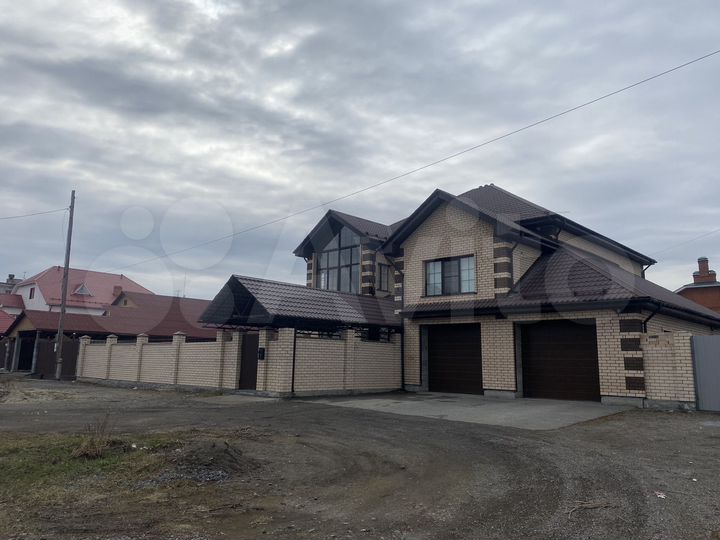 Коттедж 460 м² на участке 15 сот.