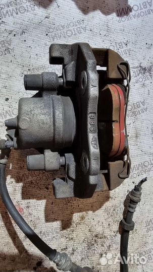 Суппорт тормозной передний Mazda 3 BL мазда