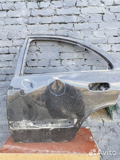 Задняя левая дверь Nissan almera b10 8067095F0B