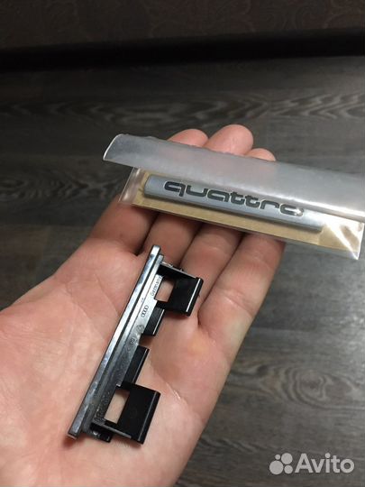 Эмблема Audi Quattro