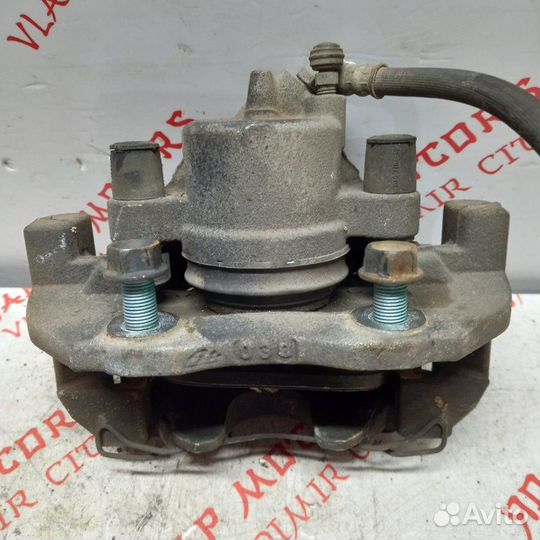 Суппорт тормозной передний правый Mazda 3 BL