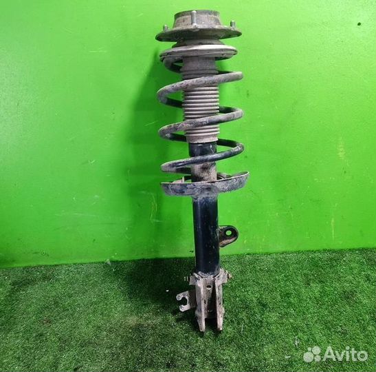 Стойка амортизатора передняя левая KIA Sportage 2