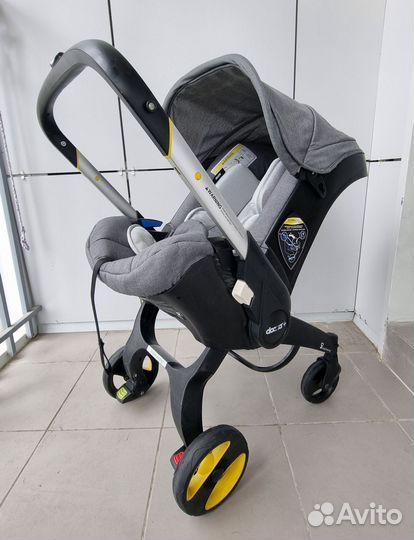 Коляска автокресло doona с базой isofix