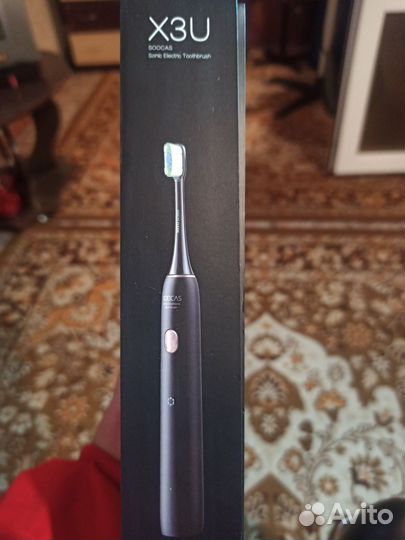 Электрическая зубная щётка