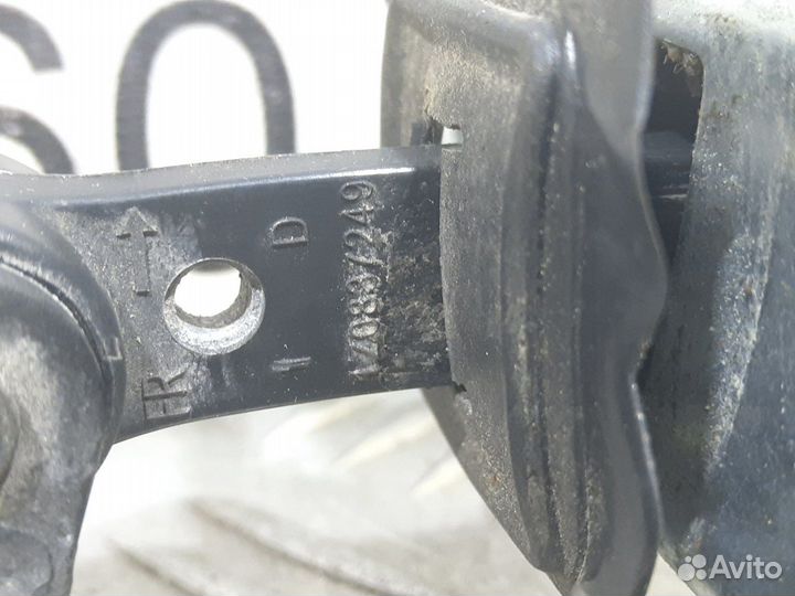 Б/У Ограничитель двери передней Octavia#005